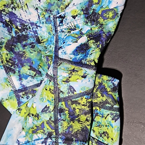 Athleta Athletic Shorts featuring vibrant colors w signature zipper on back. - Picture 5 of 8